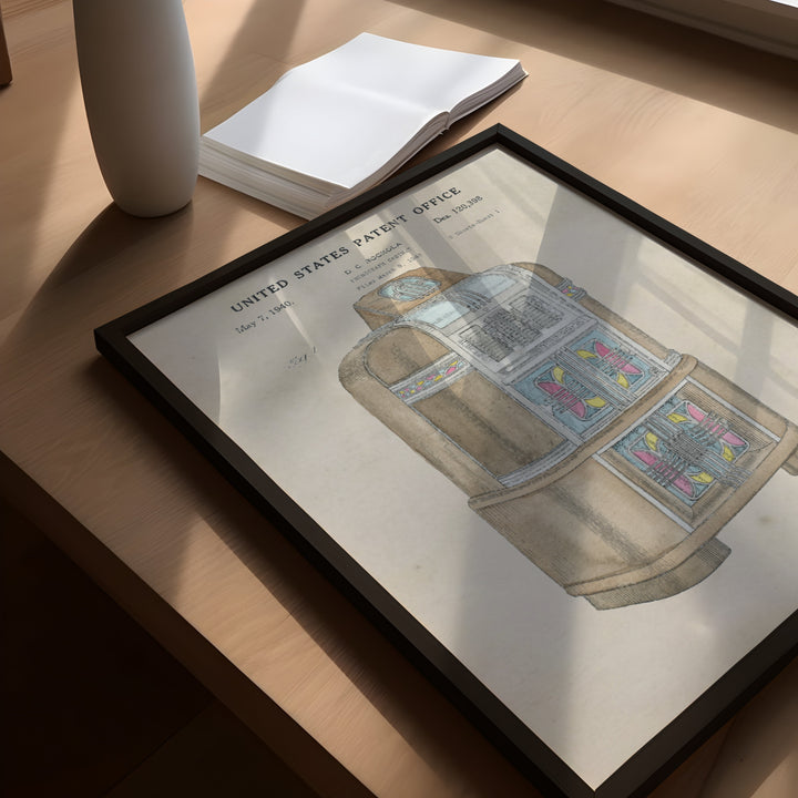 a picture of a book and a vase on a table