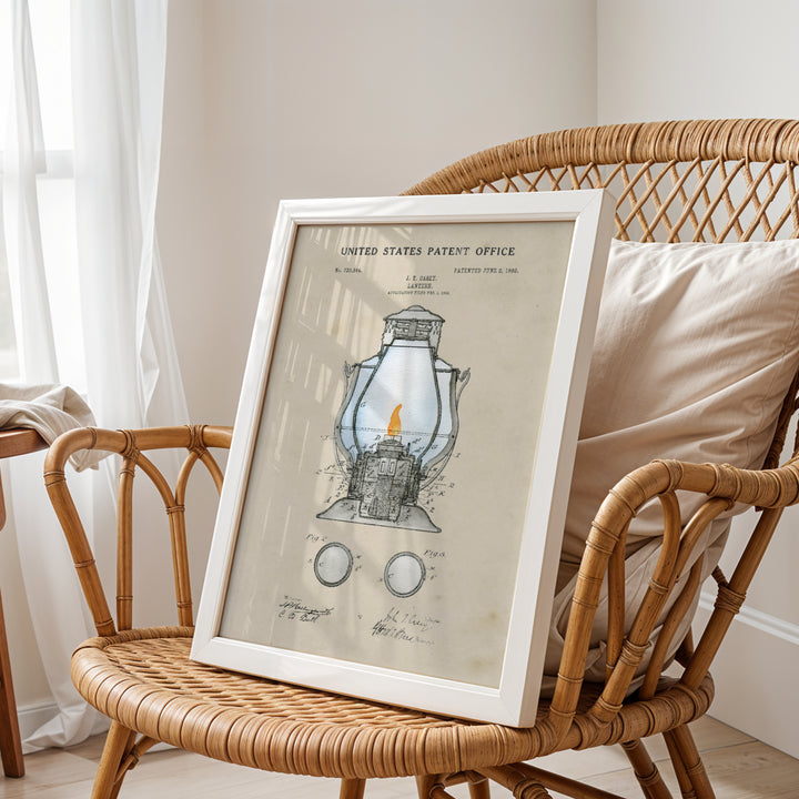 a picture of a lantern on a chair next to a wicker chair