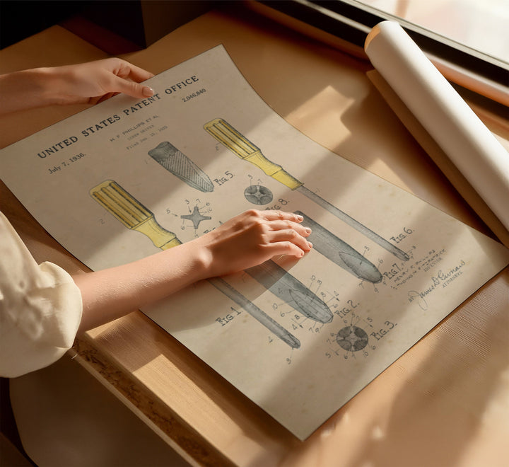 a woman's hand on top of a sheet of paper