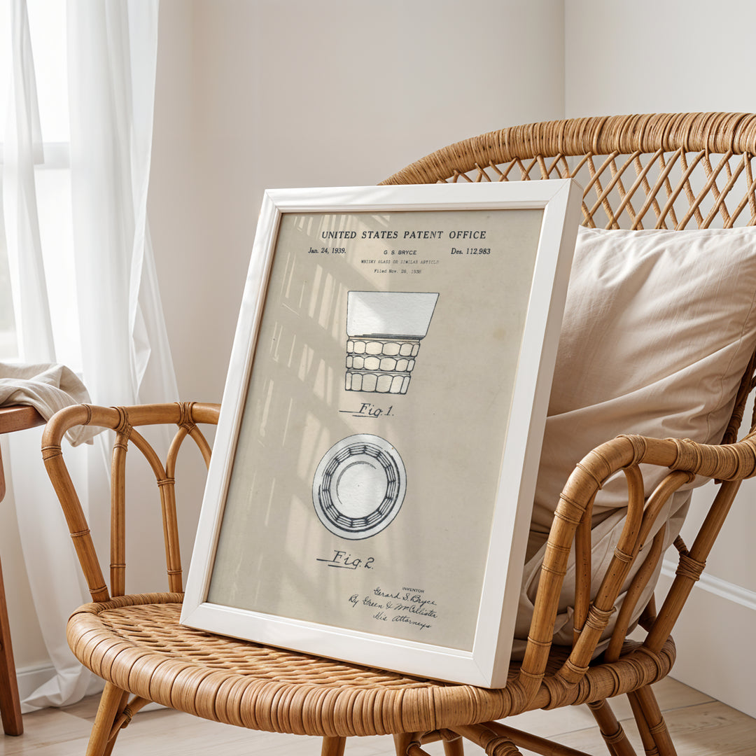 a picture frame sitting on top of a wicker chair