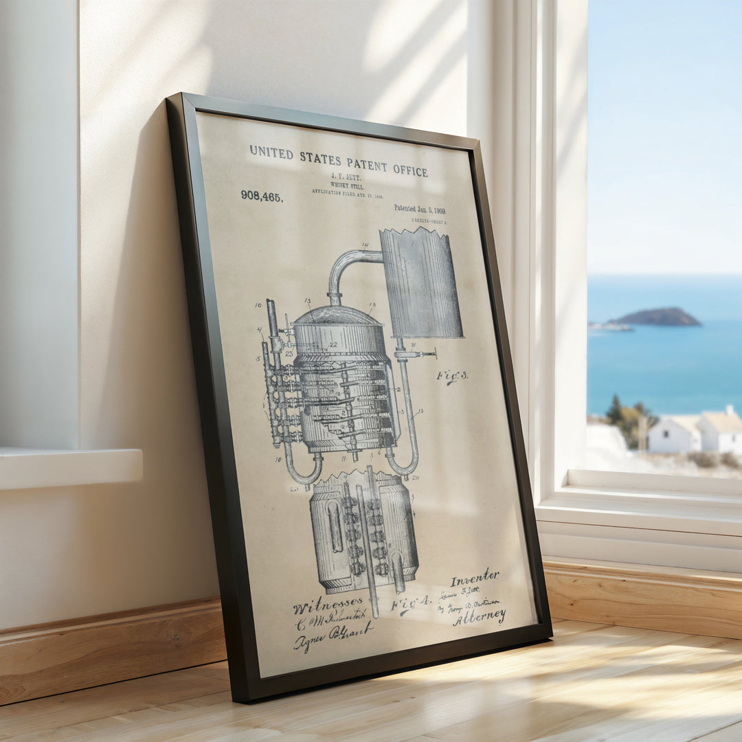 a framed drawing of a steam engine on a window sill