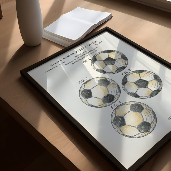 a picture of three soccer balls on a table