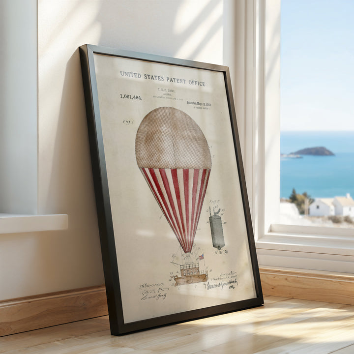 a picture of a hot air balloon on a window sill