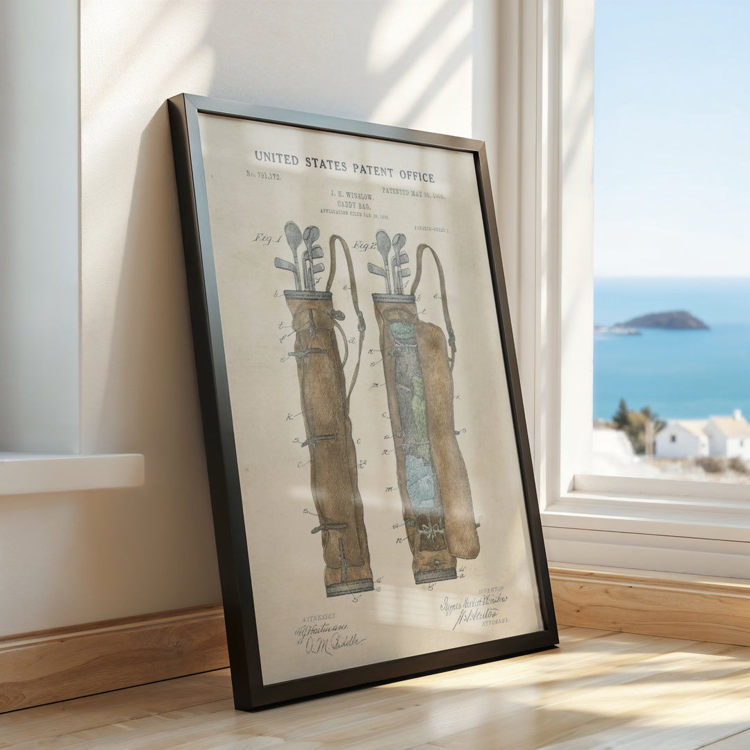 a framed picture of a pair of boots on a window sill