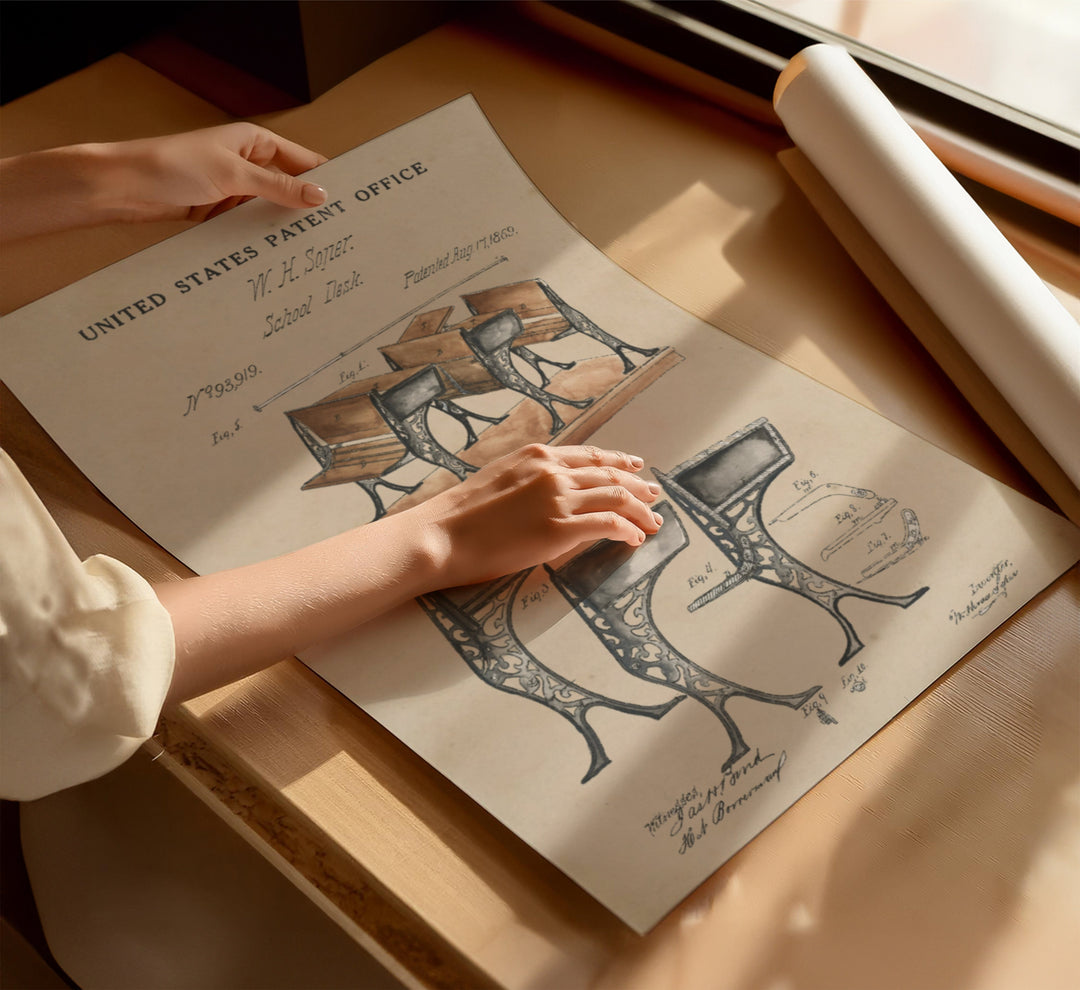 a person holding a piece of paper on top of a table