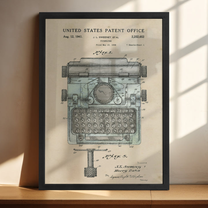 a framed poster of an old typewriter