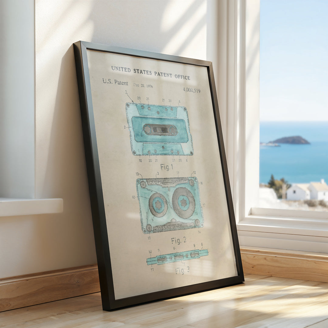 a picture frame sitting on a window sill next to a window