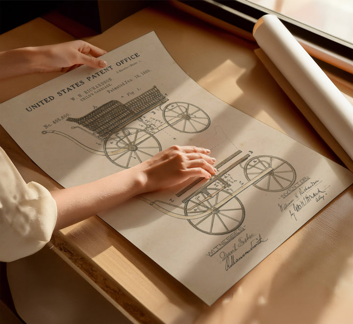 a person holding a piece of paper on top of a table