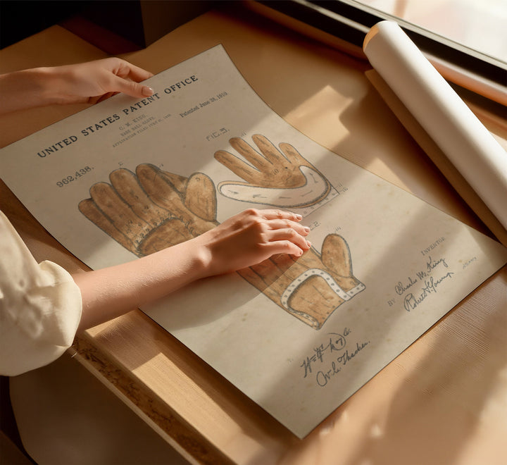 a person's hand on top of a piece of paper