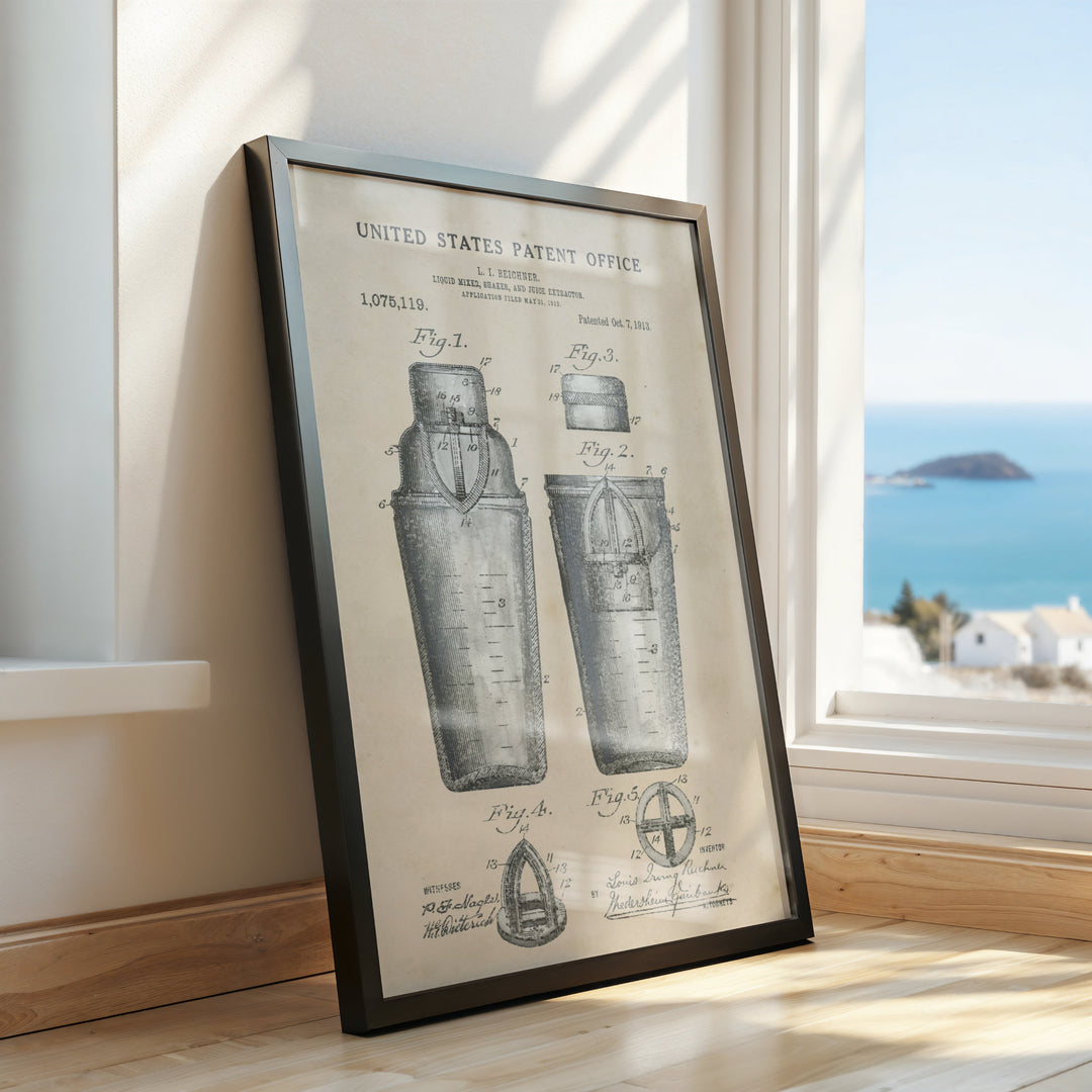 a framed picture of a bottle next to a window