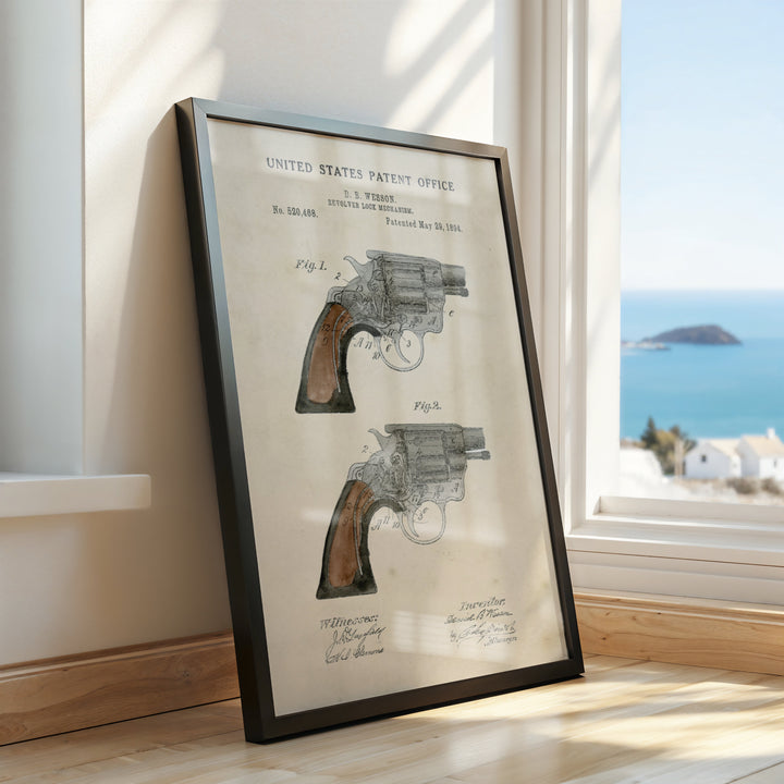 a picture of a gun on a table next to a window