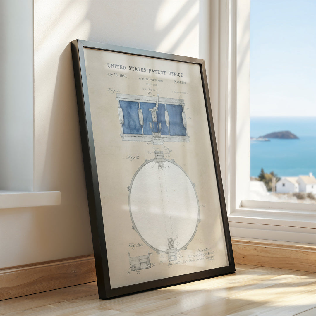 a picture frame sitting on a window sill next to a window