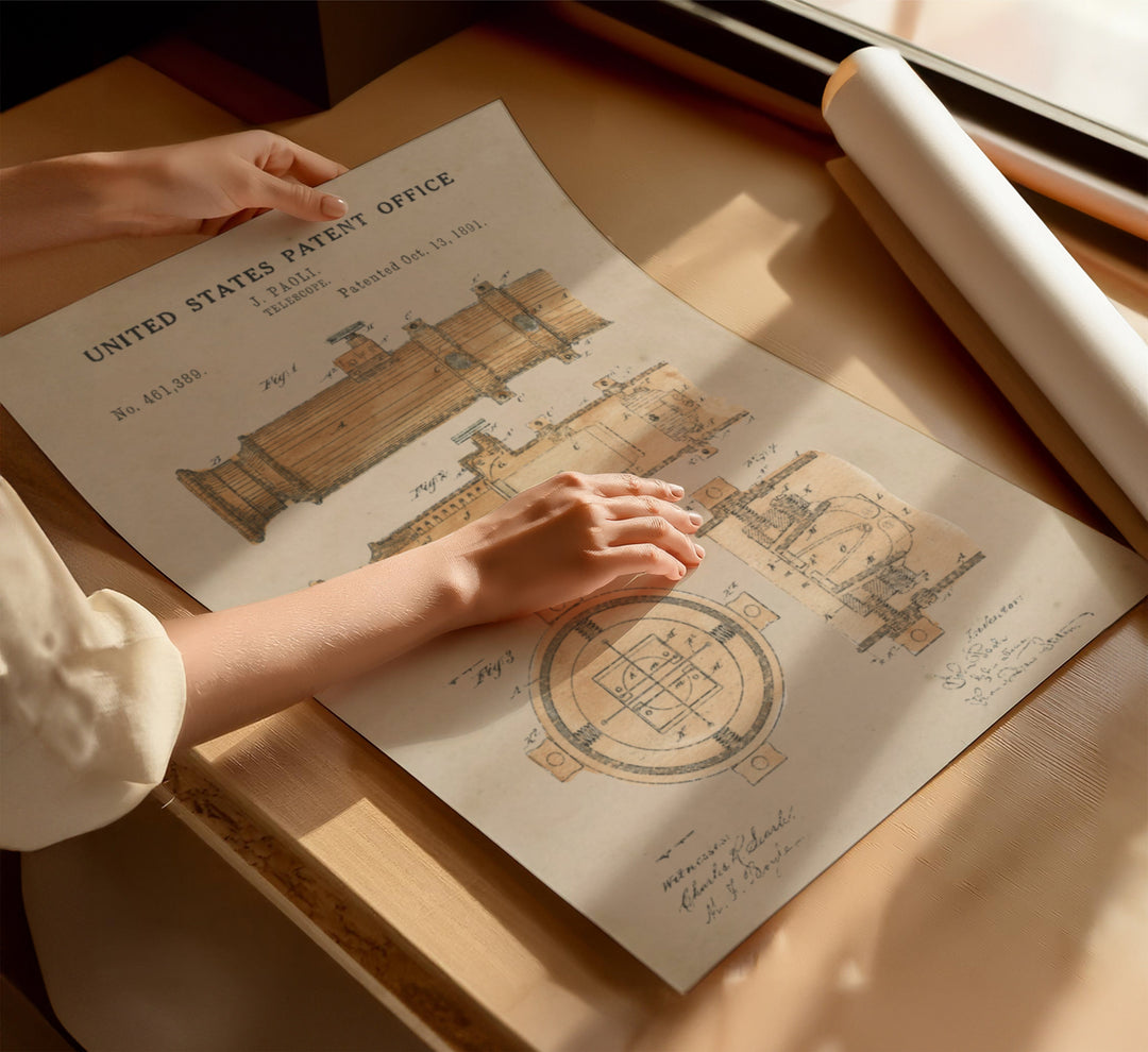 a person holding a piece of paper on top of a table