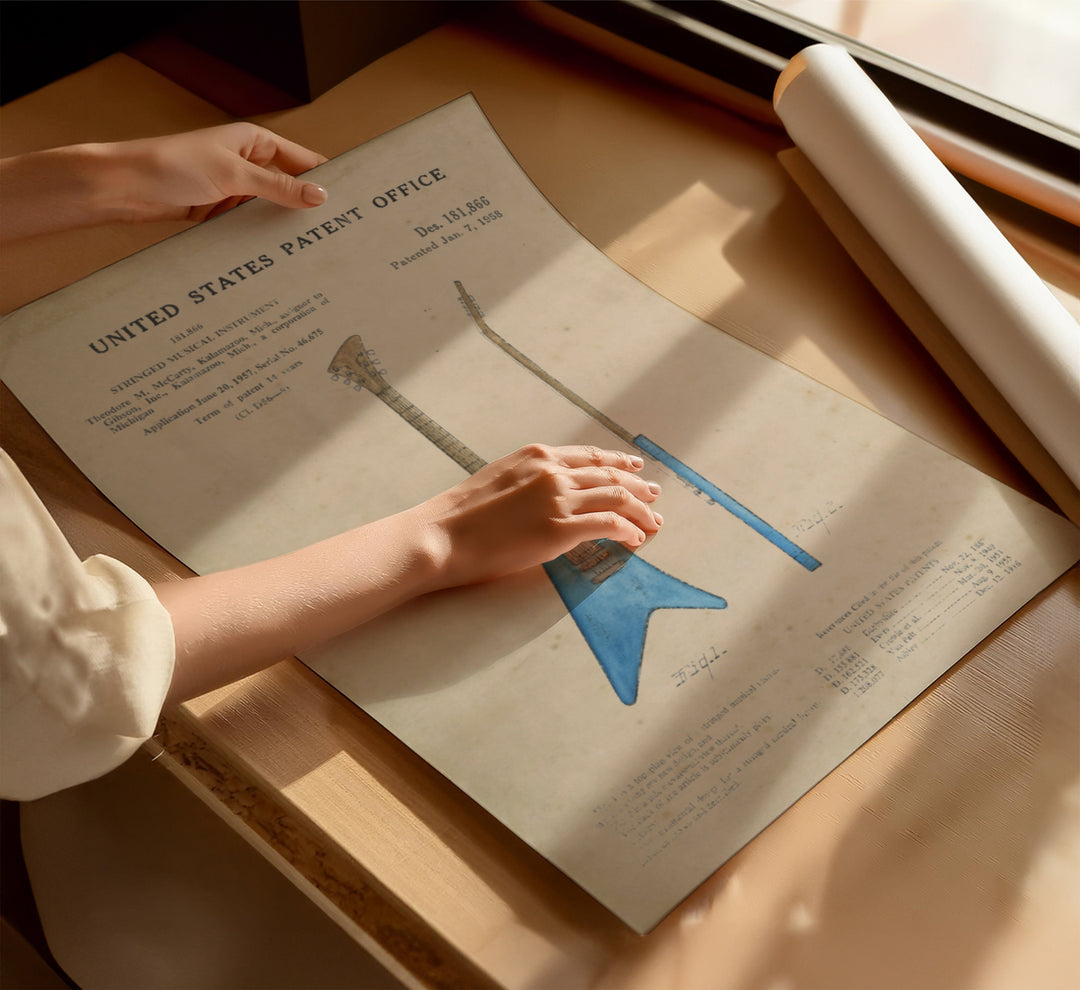 a person holding a paper with a blue arrow on it