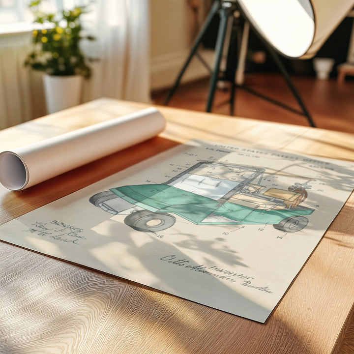 a picture of a car on a table next to a roll of paper