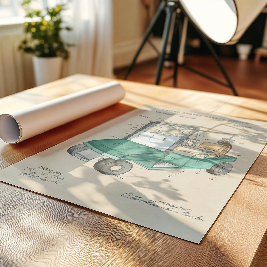 a picture of a car on a table next to a roll of paper