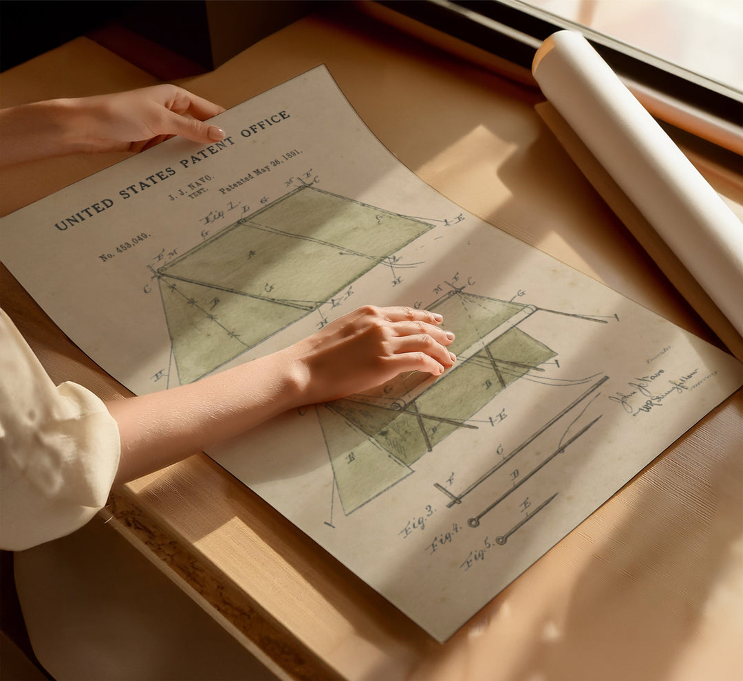 a person's hand on top of a piece of paper