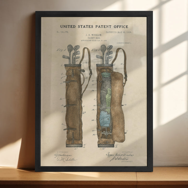 a framed picture of a pair of golf clubs