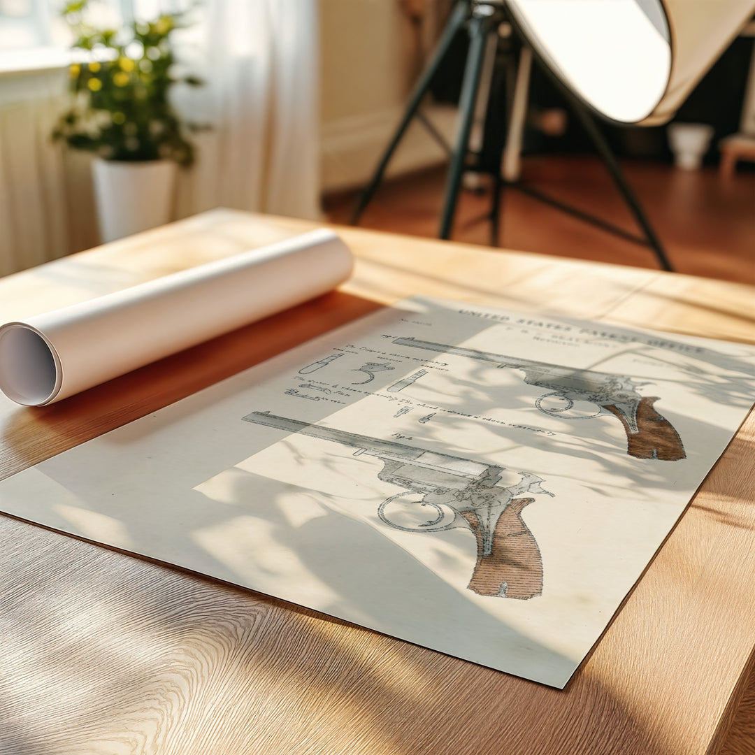 a sheet of paper on a table with a gun on it